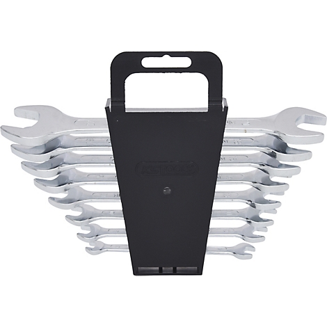 Ein Satz Schraubenschlüssel in einem schwarzen Halter.